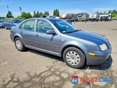 Czwarte zdjęcie samochodu z boku: 2003 VOLKSWAGEN JETTA GL VIN:3VWRK69M53M198079 - miniatura