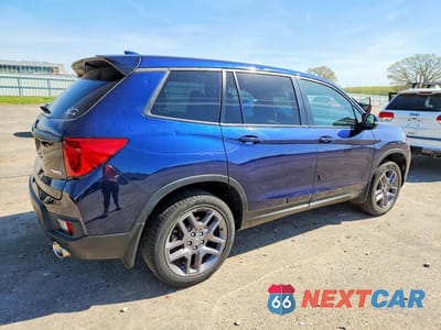 Trzecie zdjęcie samochodu z tyłu: 2022 HONDA PASSPORT EXL VIN:5FNYF8H5XNB023066 - miniatura