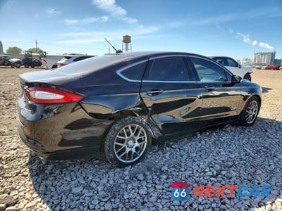 Trzecie zdjęcie samochodu z tyłu: 2016 FORD FUSION SE PHEV VIN:3FA6P0PU1GR373241 - miniatura