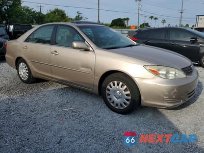 Czwarte zdjęcie samochodu z boku: 2002 TOYOTA CAMRY XLE VIN:4T1BE32K22U559910 - miniatura