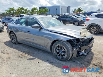 Czwarte zdjęcie samochodu z boku: 2024 BMW I4 EDRIVE 35 VIN:WBY43AW05RFS76205 - miniatura