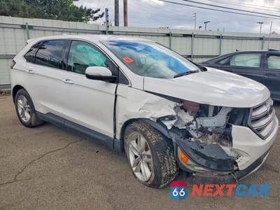 Czwarte zdjęcie samochodu z boku: 2015 FORD EDGE SEL VIN:2FMTK3J86FBB37606 - miniatura