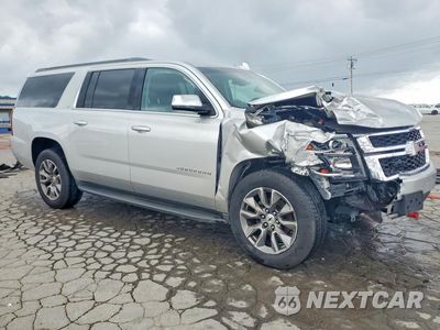 Czwarte zdjęcie samochodu z boku: 2018 CHEVROLET SUBURBAN K1500 LT VIN:1GNSKHKC3JR117455 - miniatura