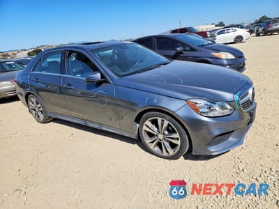Czwarte zdjęcie samochodu z boku: 2016 MERCEDES-BENZ E 350 VIN:WDDHF5KB8GB315565 - miniatura
