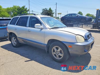 Czwarte zdjęcie samochodu z boku: 2004 HYUNDAI SANTA FE GLS VIN:KM8SC13E64U827718 - miniatura