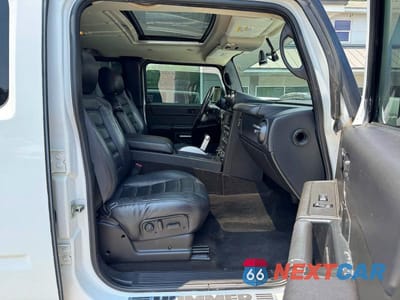 Piąte zdjęcie samochodu w środku: 2006 HUMMER H2 VIN:5GRGN23U06H106175 - miniatura