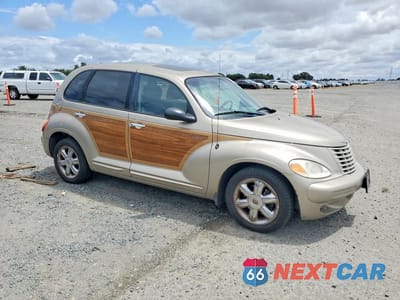 Czwarte zdjęcie samochodu z boku: 2003 CHRYSLER PT CRUISER VIN:3C8FY68B13T515767 - miniatura