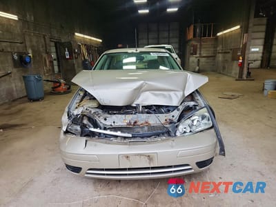 Piąte zdjęcie samochodu w środku: 2006 FORD FOCUS ZX4 VIN:1FAFP34N56W107330 - miniatura