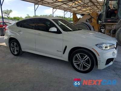 Czwarte zdjęcie samochodu z boku: 2018 BMW X6 SDRIVE35I VIN:5UXKU0C53J0G80953 - miniatura
