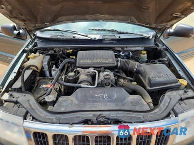 Zdjęcie 11 z 12 samochodu: 2002 JEEP GRAND CHEROKEE VIN:1J8GW68J12C206709 - miniatura
