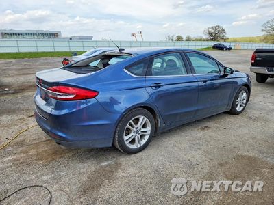 Trzecie zdjęcie samochodu z tyłu: 2018 FORD FUSION SE VIN:3FA6P0HD8JR230096 - miniatura