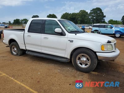 Czwarte zdjęcie samochodu z boku: 2001 FORD F150 SUPERCREW VIN:1FTRW07L31KC51736 - miniatura