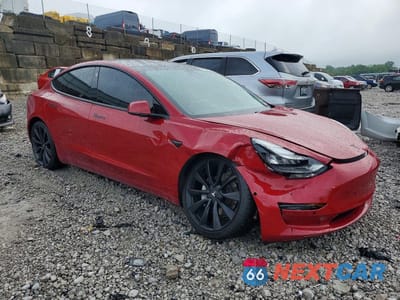 Czwarte zdjęcie samochodu z boku: 2019 TESLA MODEL 3 VIN:5YJ3E1EB6KF389794 - miniatura