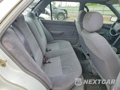 Zdjęcie 10 z 12 samochodu: 1995 FORD ESCORT LX VIN:3FASP13J2SR125587 - miniatura