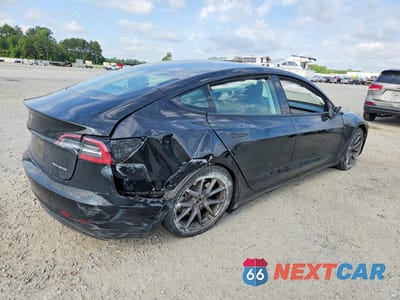Trzecie zdjęcie samochodu z tyłu: 2022 TESLA MODEL 3 VIN:5YJ3E1EB9NF202472 - miniatura