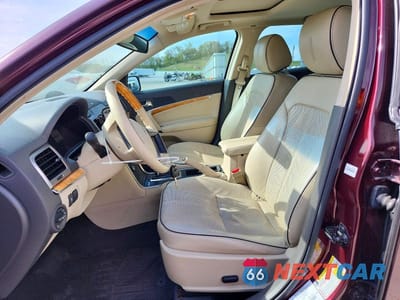 Zdjęcie 7 z 13 samochodu: 2012 LINCOLN MKZ HYBRID VIN:3LNDL2L32CR824169 - miniatura