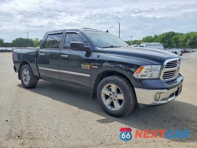 Czwarte zdjęcie samochodu z boku: 2015 RAM 1500 SLT VIN:3C6RR7LTXFG710112 - miniatura