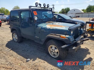 Czwarte zdjęcie samochodu z boku: 1995 JEEP WRANGLER VIN:1J4FY19P5SP266062 - miniatura