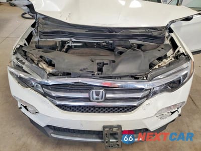Zdjęcie 12 z 14 samochodu: 2017 HONDA PILOT ELITE VIN:5FNYF6H09HB011133 - miniatura