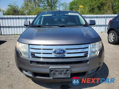 Piąte zdjęcie samochodu w środku: 2010 FORD EDGE SEL VIN:2FMDK4JC6ABB75506 - miniatura