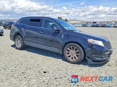 Czwarte zdjęcie samochodu z boku: 2014 LINCOLN MKT VIN:2LMHJ5NK7EBL57835 - miniatura