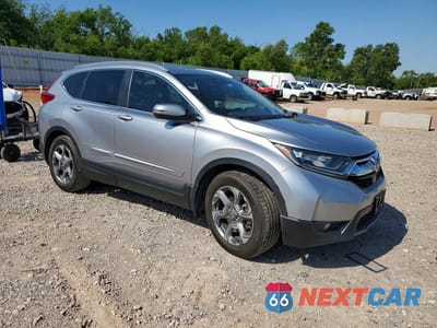 Czwarte zdjęcie samochodu z boku: 2017 HONDA CR-V EXL VIN:7FARW1H89HE003907 - miniatura