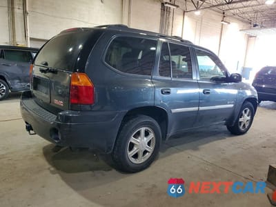Trzecie zdjęcie samochodu z tyłu: 2006 GMC ENVOY VIN:1GKDT13S962313528 - miniatura