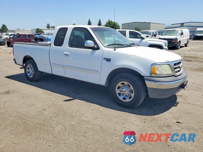 Czwarte zdjęcie samochodu z boku: 2002 FORD F150 VIN:1FTPX17L52NB15005 - miniatura