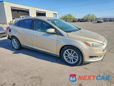 Czwarte zdjęcie samochodu z boku: 2018 FORD FOCUS SE VIN:1FADP3F20JL204018 - miniatura