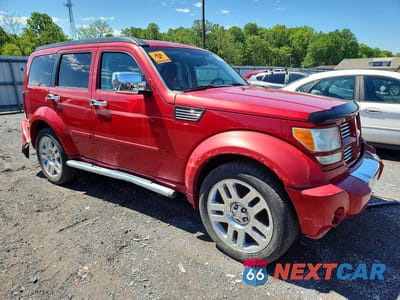 Czwarte zdjęcie samochodu z boku: 2011 DODGE NITRO HEAT VIN:1D4PU4GX8BW606985 - miniatura