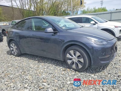 Czwarte zdjęcie samochodu z boku: 2024 TESLA MODEL Y VIN:7SAYGDEE0RA226466 - miniatura