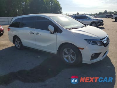 Czwarte zdjęcie samochodu z boku: 2018 HONDA ODYSSEY EX VIN:5FNRL6H54JB065731 - miniatura