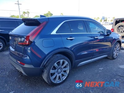 Trzecie zdjęcie samochodu z tyłu: 2019 CADILLAC XT4 PREMIUM LUXURY VIN:1GYFZCR44KF152395 - miniatura