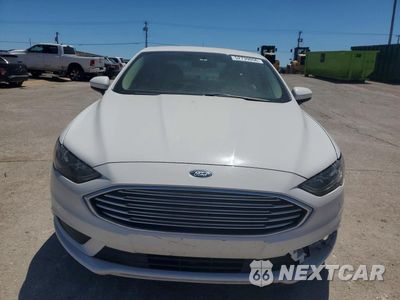 Piąte zdjęcie samochodu w środku: 2017 FORD FUSION SE HYBRID VIN:3FA6P0LU5HR323269 - miniatura