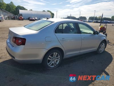 Trzecie zdjęcie samochodu z tyłu: 2009 VOLKSWAGEN JETTA TDI VIN:3VWAL71K29M125013 - miniatura