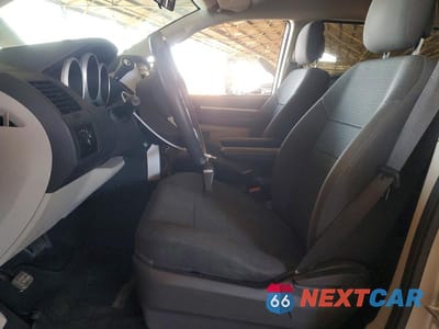Zdjęcie 7 z 13 samochodu: 2010 DODGE GRAND CARAVAN SE VIN:2D4RN4DE3AR326973 - miniatura
