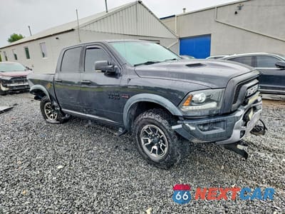 Czwarte zdjęcie samochodu z boku: 2016 RAM 1500 REBEL VIN:1C6RR7YT8GS118386 - miniatura