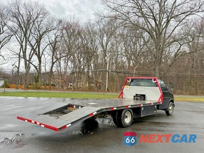Czwarte zdjęcie samochodu z boku: 1999 GMC SAVANA CUTAWAY G3500 VIN:1GDJG31R9X1076492 - miniatura