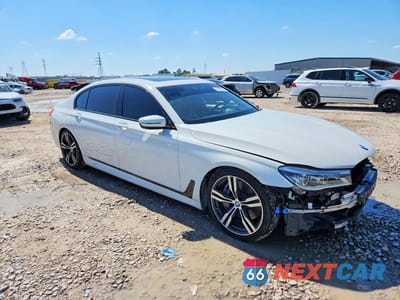 Czwarte zdjęcie samochodu z boku: 2018 BMW 750 I VIN:WBA7F0C58JGM23449 - miniatura