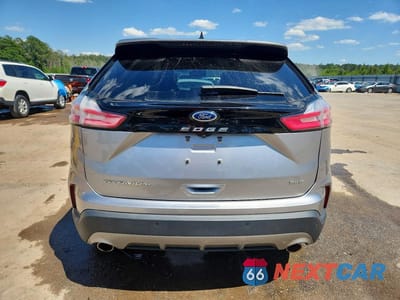 Zdjęcie 6 z 13 samochodu: 2022 FORD EDGE TITANIUM VIN:2FMPK4K96NBA31380 - miniatura