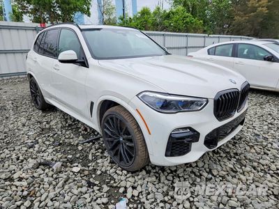 Czwarte zdjęcie samochodu z boku: 2021 BMW X5 M50I VIN:5UXJU4C00M9G95160 - miniatura