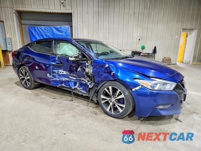 Czwarte zdjęcie samochodu z boku: 2018 NISSAN MAXIMA 3.5 SL VIN:1N4AA6AP3JC374396 - miniatura