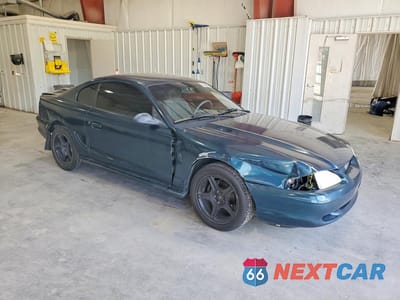 Czwarte zdjęcie samochodu z boku: 1994 FORD MUSTANG VIN:1FALP4049RF123119 - miniatura