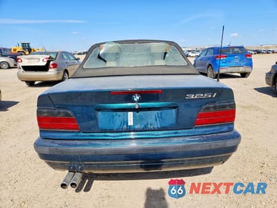 Zdjęcie 6 z 12 samochodu: 1994 BMW 325 IC AUTOMATIC VIN:WBABJ632XRJD32606 - miniatura