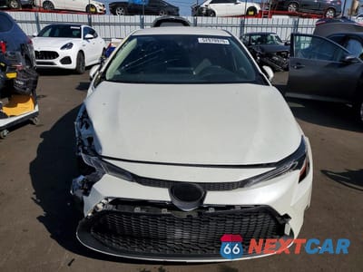 Piąte zdjęcie samochodu w środku: 2021 TOYOTA COROLLA LE VIN:JTDEPMAE5MJ136367 - miniatura