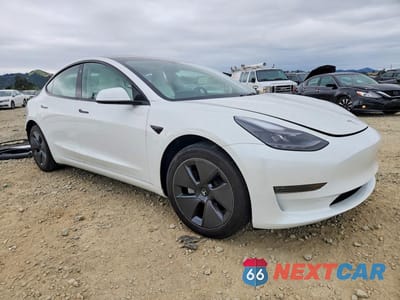 Czwarte zdjęcie samochodu z boku: 2023 TESLA MODEL 3 VIN:5YJ3E1EA7PF607255 - miniatura