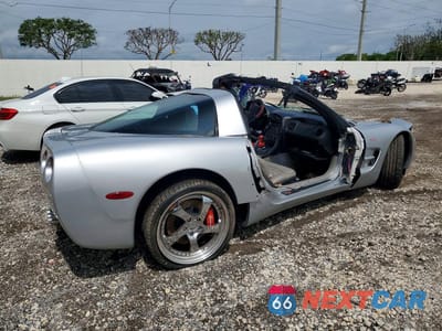 Trzecie zdjęcie samochodu z tyłu: 1999 CHEVROLET CORVETTE VIN:1G1YY22G9X5128762 - miniatura
