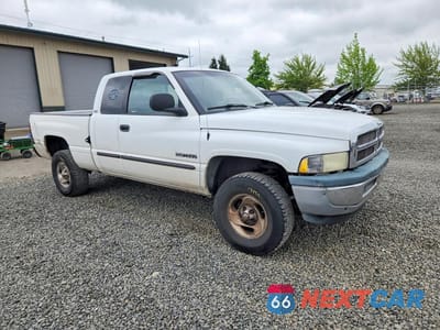 Czwarte zdjęcie samochodu z boku: 2001 DODGE RAM 1500 VIN:3B7HF13Z31G806283 - miniatura