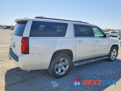 Trzecie zdjęcie samochodu z tyłu: 2017 CHEVROLET SUBURBAN K1500 LT VIN:1GNSKHKC2HR289163 - miniatura