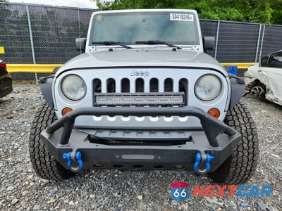 Piąte zdjęcie samochodu w środku: 2010 JEEP WRANGLER UNLIMITED SPORT VIN:1J4BA3H11AL218110 - miniatura